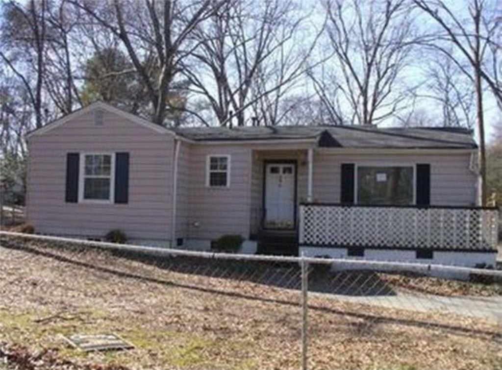 Charming 2-bedroom, 1-bath ranch in Forest Park! This cozy single-level home offers an open-concept family and dining area with an eat-in kitchen featuring a breakfast bar, crisp white cabinets, and included refrigerator. The master bedroom is on the main level with a walk-in closet, while the mix of carpet and wood flooring adds warmth throughout. The property comes equipped with a water heater and a brand-new air conditioning system, giving added comfort for daily living. Outside, enjoy the fenced backyard perfect for pets or outdoor gatherings, plus a covered front porch and driveway parking. Located on a 0.28-acre lot with public utilities already in place, near public transportation, schools, and local attractions such as the Atlanta State Farmers Market, Clayton County International Park, and just minutes from downtown Atlanta. Ideal for first-time buyers, small families, or investors looking for a great opportunity. Don’t miss it—schedule your showing today!