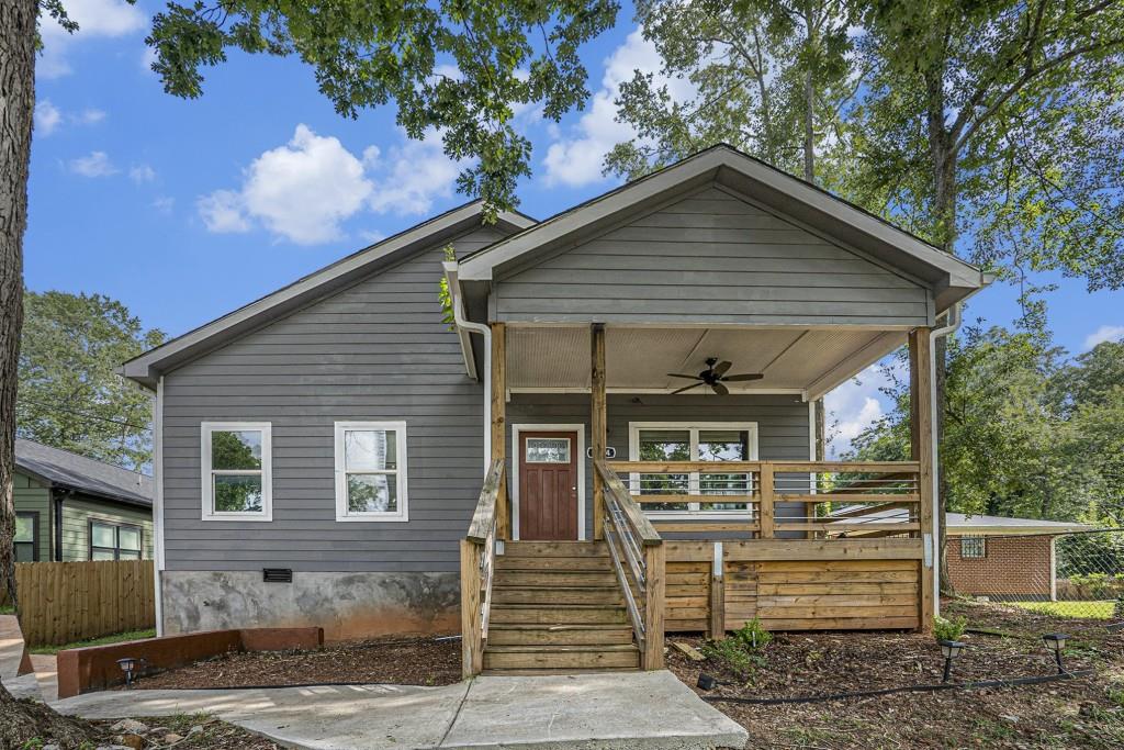 This Approved Short Sale is an Incredible Opportunity in a Prime East Point Location. Fully Updated Charmer just minutes from the Atlanta Airport with Easy Access to Highways, Downtown, and all the Local Shops and Dining that make East Point so Special. Whether you're a First-Time Homebuyer or a Savvy Investor, this Home is a Perfect Fit. Step onto the Covered Front Porch with a Ceiling Fan, an Ideal Spot for Morning Coffee or Relaxing Evenings in a Rocking Chair. Inside, you'll find an Open Concept Floor Plan with Dark Hardwood Floors, a Fireside Living Room featuring a Reclaimed Wood Mantel and Gas Fireplace, and Seamless Flow into the Stylish Kitchen. Enjoy White Cabinets, Floating Shelves, and a Spacious Island that's Perfect for Casual Dining or Hosting Friends. A Separate Dining Room is Flooded with Natural Light from French Doors that Open to a Large Back Deck, Perfect for Al Fresco Meals or Outdoor Entertaining. The Primary Suite is a True Retreat with a Tray Ceiling and an Ensuite Bathroom featuring Double Vanities and a Tub and Shower Combo. Two Additional Bedrooms Offer Tall Ceilings and a Shared Bathroom, Great for Guest Suites or a Home Office. Outside, the Grassy Backyard Provides the Right Amount of Space for Play, Pets, or Hosting Weekend Gatherings. This Home Truly Checks All the Boxes. Updated, Conveniently Located, and Full of Charm. Don't Miss Your Chance to Own a Slice of East Point Living.