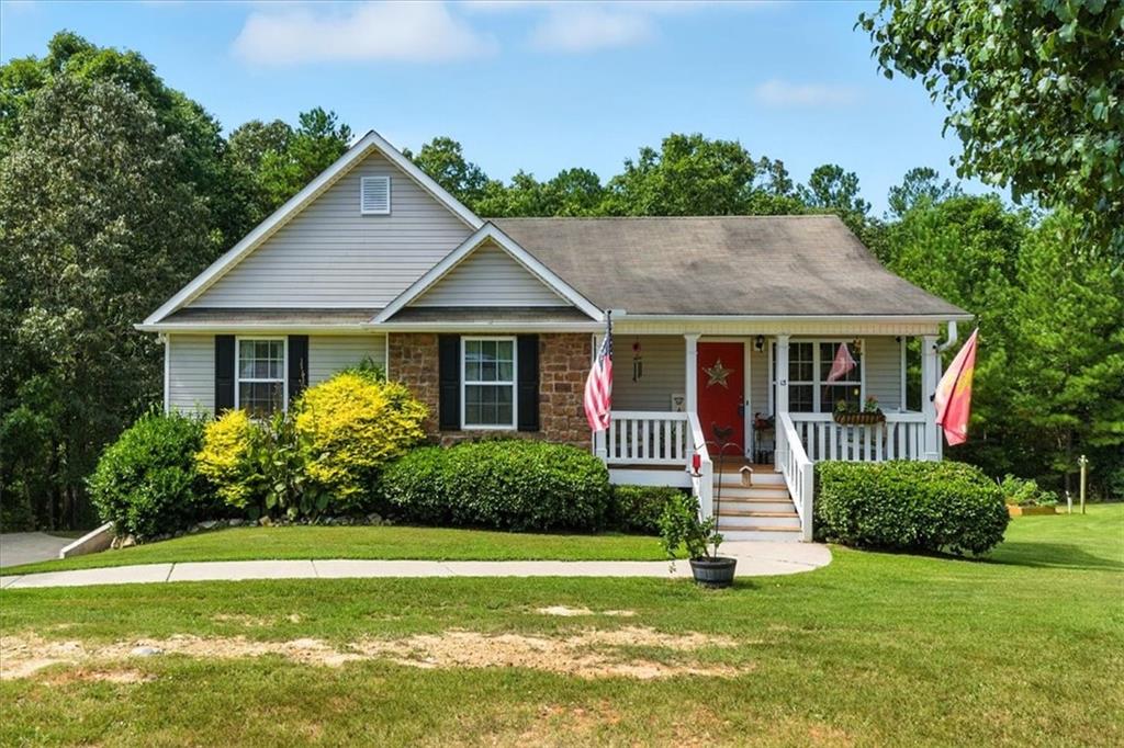 Welcome to country living with plenty of charm! This raised ranch in Adairsville sits on a peaceful 1.47-acre cul-de-sac lot, offering room to spread out and enjoy the outdoors. The property features a spacious yard perfect for gardening, hobbies, or simply soaking up the quiet surroundings—and it even comes ready for chickens, making it ideal for those dreaming of a small homestead lifestyle. Inside, the home offers the convenience of a raised ranch layout with comfortable living spaces and a cozy kitchen with white cabinets and stainless steel appliances. LVP flooring is featured throughout the home (no carpet anywhere!). The basement has plenty of room for storage, a workshop, or you could finish it for extra living space. If you’ve been looking for a home with land, character, and a touch of farm life, this Adairsville property is the perfect fit!