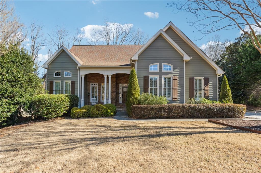 Welcome to the swim/tennis community of Haddon Hall in North Forsyth! Hard to find RANCH on FINISHED BASEMENT on a cul-de-sac with HUGE fenced back yard! The spacious main level features a formal dining room ideal for entertaining, and a kitchen with granite countertops, double ovens, and a charming shiplap accent wall. The primary suite is conveniently located on the main floor and includes a private walk-out to an oversized deck with new, low-maintenance composite decking. The luxurious en-suite bathroom boasts his-and-her vanities and closets, a soaking tub, and a beautifully updated shower with frameless glass. The main floor also includes two additional bedrooms, a full bath with a frameless glass shower and luxury wallpaper. The laundry room is conveniently located on the main level and adorned with BARN DOORS! Heading downstairs you will love the custom built-in bookcase and updated lighting on your way to the large living space perfect for movie watching. This level has GOBS of storage, two more bedrooms and another updated full bathroom. You will appreciate the TANKLESS water heater, along with a flex room that can be used however you like! The basement area walks out to a workshop with garage door for storing larger toys like a golf cart! The HUGE backyard is swoon worthy and just had a $30,000 upgrade with NEW professionally installed zoysia sod, NEW composite decking, fresh stain on the privacy fence AND gutter guards. You will love the fire pit with solar cafe lights strung in the trees - a perfect spot for making outdoor memories. Turn the outdoor POWERED shed into a dream space or use it for yard equipment or extra workshop. The driveway is extra long and this house is wired with a 220V outlet to charge your RV right in the driveway! It is also pre-wired for a whole house generator. Security system with hard wired cameras is ready to connect to your preferred security company. Conveniently located near shopping, dining, healthcare, and 400, this home provides the perfect blend tranquility and accessibility. Senior tax rate reflected. FREE APPRAISAL AND LENDER CREDITS AVAILABLE WITH PREFERRED LENDER. Please inquire with listing agent for more information. Community allows rentals with minimum of 6 month lease - no caps.