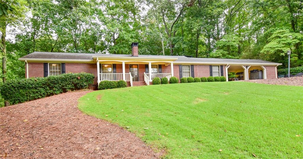 Welcome to 528 Hickory Drive! This charming 4-side Brick Ranch is located in lovely Whitlock Heights, a well-established neighborhood in the City of Marietta. Minutes from the Square and within walking distance to Hickory Hills Elementary School and Tumlin Park this home boasts 3 bedrooms and 2 UPDATED bathrooms. The hall bath is easily accessed by the secondary bedrooms while the primary bedroom includes an ensuite bath with double vanity and walk in closet. There is ample closet space throughout and a flex room that could serve as a den, office or playroom. This home has a generous front lawn and private back yard with room for an addition if needed. The hardwood floors, painted paneling and new Dining Room wallpaper are just a few of the updates that your buyer will appreciate! This home will appeal to a variety of buyers with the ease of one story living, the quality craftsmanship and thoughtful improvements!