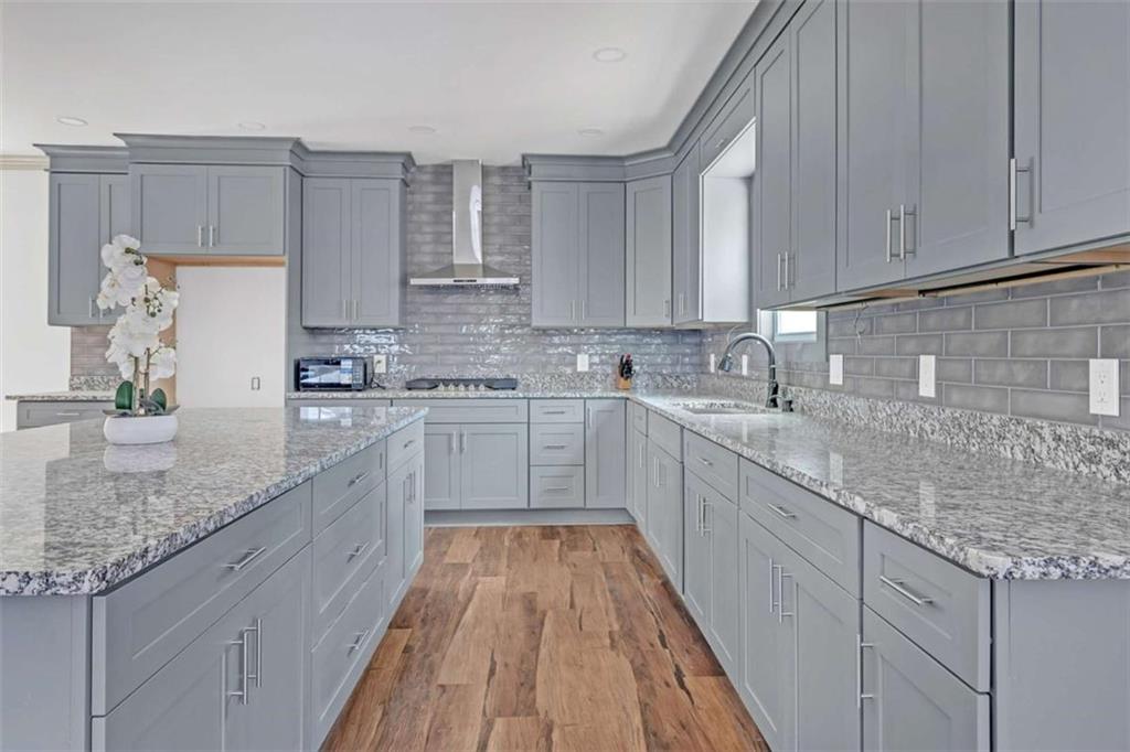 Price Improvement!!!!! New construction home, perfect for a large family, featuring 9 bedrooms, 6 bathrooms, and 4,732 sqft of thoughtfully designed living space. The first floor boasts a Jack and Jill room, a spacious master suite, a beautiful open-concept kitchen with brand-new appliances, and a convenient laundry room. Upstairs, you'll find a second master suite, additional bedrooms, and a separate living area, providing ample space for relaxation and entertainment. Come add your final finishes.