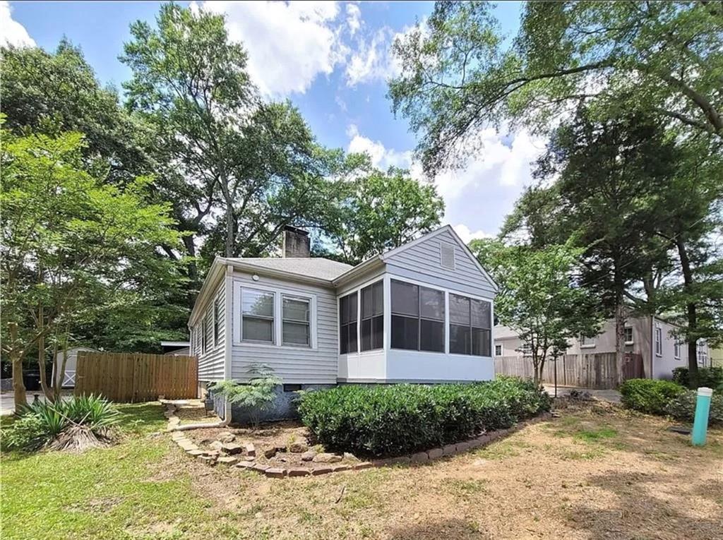 Welcome to this beautifully updated 3-bedroom, 2-bath ranch located just off Fairground Street in the heart of Marietta. Perfectly situated between the 120 Loop and Roswell Street, this home is less than a mile from Marietta Square, where you’ll enjoy year-round festivals, live music, dining, and entertainment.
The inviting front porch opens into a spacious living room with a cozy fireplace, a separate dining room, and a stylish kitchen featuring stainless steel appliances, granite countertops, and pearl-white cabinetry. The home also offers a large laundry/mudroom with access to the back patio, updated bathrooms with modern finishes, and flexible living space. Two main bedrooms are complemented by a third room that can serve as an office, playroom, or extra bedroom, complete with its own full bath and tiled shower.
Enjoy rear parking, a storage shed, and a large patio area—ideal for summer BBQs or outdoor gatherings. With hardwood and ceramic tile floors throughout, paired with soft gray walls and crisp white trim, this home has a fresh and modern feel in one of Marietta’s most desirable locations.
***LEASES MUST END APRIL-AUGUST WITH 12 MONTH MINIMUM LEASE TERM***
Pets: Negotiable, please call for more details
