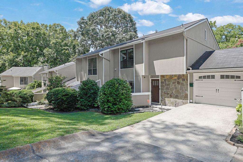 Welcome to 2312 Colonial Drive NE in the highly sought-after Weathers Creek community of Brookhaven, GA. This beautifully updated townhome offers a perfect blend of elegance, comfort, and location. With its stylish design, thoughtful upgrades, and exceptional walkability, it provides a unique opportunity to experience modern living in one of Atlanta's most desirable neighborhoods.
As you enter, you'll be greeted by an open-concept layout filled with natural light, showcasing gleaming hardwood floors, high ceilings, and elegant designer details throughout. The spacious living and dining areas are anchored by a cozy fireplace, creating an ideal setting for both relaxation and entertaining. The renovated kitchen is a true highlight, featuring granite countertops, stainless steel appliances, a custom tile backsplash, and sleek white cabinetry—combining beauty and functionality.
Upstairs, you'll find three generously sized bedrooms and two and a half luxurious bathrooms. The primary suite serves as a peaceful retreat, complete with custom finishes and a spa-like bathroom. Every inch of this home reflects exceptional craftsmanship and attention to detail, offering a sense of comfort and refinement.
The private, fenced backyard and expansive wood deck are perfect for relaxing or entertaining. Whether it's morning coffee or evening gatherings, this outdoor space offers tranquility and privacy. A one-car garage and a low monthly HOA covering water, pest control, trash, and lawn maintenance make for an easy, low-maintenance lifestyle.
Located in the heart of Weathers Creek, this home is perfectly positioned for convenience. You're just minutes from the vibrant shops, dining, and amenities at Town Brookhaven, including restaurants, LA Fitness, Costco, and a movie theater. For everyday essentials, Cherokee Plaza is within walking distance, featuring Starbucks, Kroger, and a variety of local eateries. Commuting is a breeze with the nearby Brookhaven/Oglethorpe MARTA Station, providing direct access to Midtown, Buckhead, Downtown, and the airport. Outdoor enthusiasts will appreciate the proximity to parks such as Murphey Candler Park and Blackburn Park, as well as the Peachtree Creek Greenway, offering miles of scenic trails for walking, biking, and more.
Families will love the excellent local schools, including those in the DeKalb County district, as well as access to private schools and Oglethorpe University. The Weathers Creek community is known for its tree-lined streets, peaceful atmosphere, and close-knit vibe, offering a tranquil retreat while still being minutes away from all the action.
2312 Colonial Drive isn’t just a home; it’s a lifestyle. With its impeccable design, prime location, and community-oriented charm, this is an opportunity you won’t want to miss. This one won’t last long.
