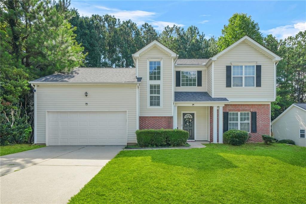 Welcome to this well-maintained 4 bed, 2.5 bath home in a prime Austell location! Inside, enjoy an open-concept layout with a spacious living room featuring a cozy fireplace, an updated kitchen with white cabinetry, stainless steel appliances, center island, and built-in desk nook, plus a separate dining room. The main level also includes a laundry room, half bath, and access to the 2-car garage.
Upstairs you'll find four generously sized bedrooms with walk-in closets, including one with a large storage area and crawl space access. The fully renovated bathrooms showcase modern tile work, vanities, and fixtures.
Enjoy a large backyard perfect for entertaining or adding your personal touch. Located just minutes from Six Flags, Smyrna, downtown Atlanta, the airport, and major highways including I-20 & I-285—this home offers convenience, space, and style all in one!