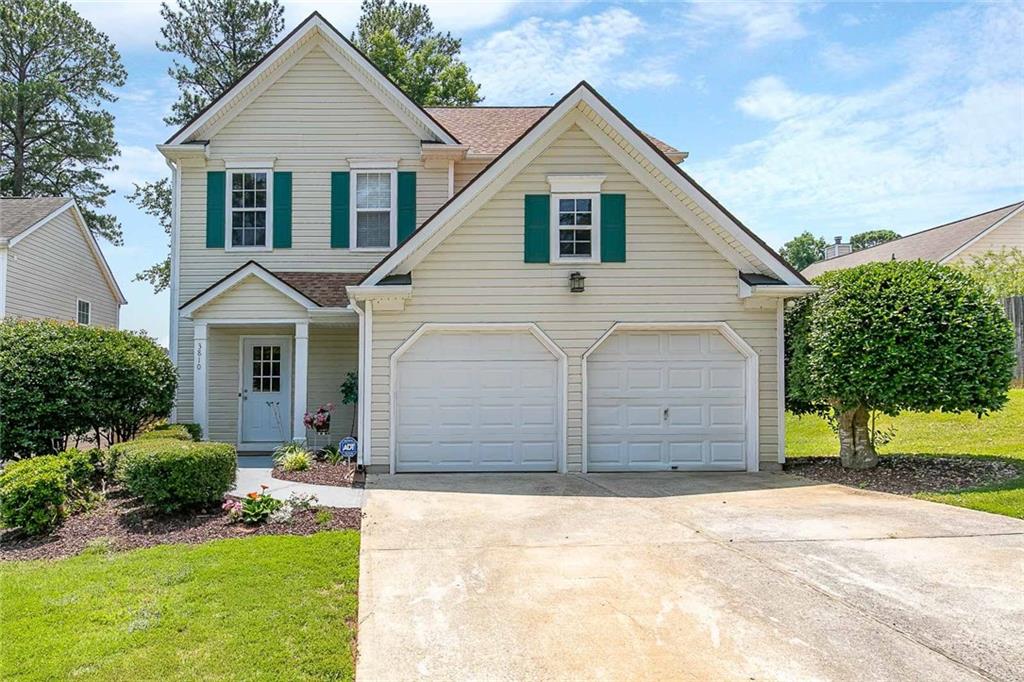 Welcome Home! Lovely two story in friendly swim/tennis community. Perfect location close to shopping, restaurants, commuter roads, and schools. Provides quick, easy access to I-85 and Ronald Reagan Pkwy. You'll love the incredible open layout great for entertaining and the tons of natural light. End your days relaxing in the spacious fireside family room graced with an open view to the white eat-in kitchen boasting ample storage space. Just off the family room is a large grilling patio for those family gatherings. The outbuilding offers great flex space for an at-home office. Escape upstairs to a large master retreat to envy with dual vanities, separate shower, soaking tub. Two ample sized secondary bedrooms and full guest bath complete the upper level. Low maintenance, fenced-in backyard perfect for kids and pets. Don't miss this opportunity!