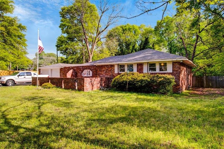 Spacious 4-Bedroom Home in Conyers, GA - Move-In Ready  Great investment opportunity in Olde Town Conyers! This spacious 4-bedroom, 2.5-bath brick ranch offers nearly 2,800 sq ft of total living space on a large, level lot with a private backyard. The home features an open floor plan, a brand new modern kitchen with granite countertops and stainless steel appliances, and a cozy living room perfect for entertaining.    The primary suite includes a walk-in closet and en-suite bath, while three additional bedrooms provide ample space for family or guests. A detached rear building includes three rooms, a bathroom, and space for a kitchenette-ideal for additional income or multi-use space. Enjoy a 2-car garage and a quiet neighborhood close to shopping, dining, and everything Conyers has to offer. Double rental potential makes this one a must-see. Schedule your private tour today!