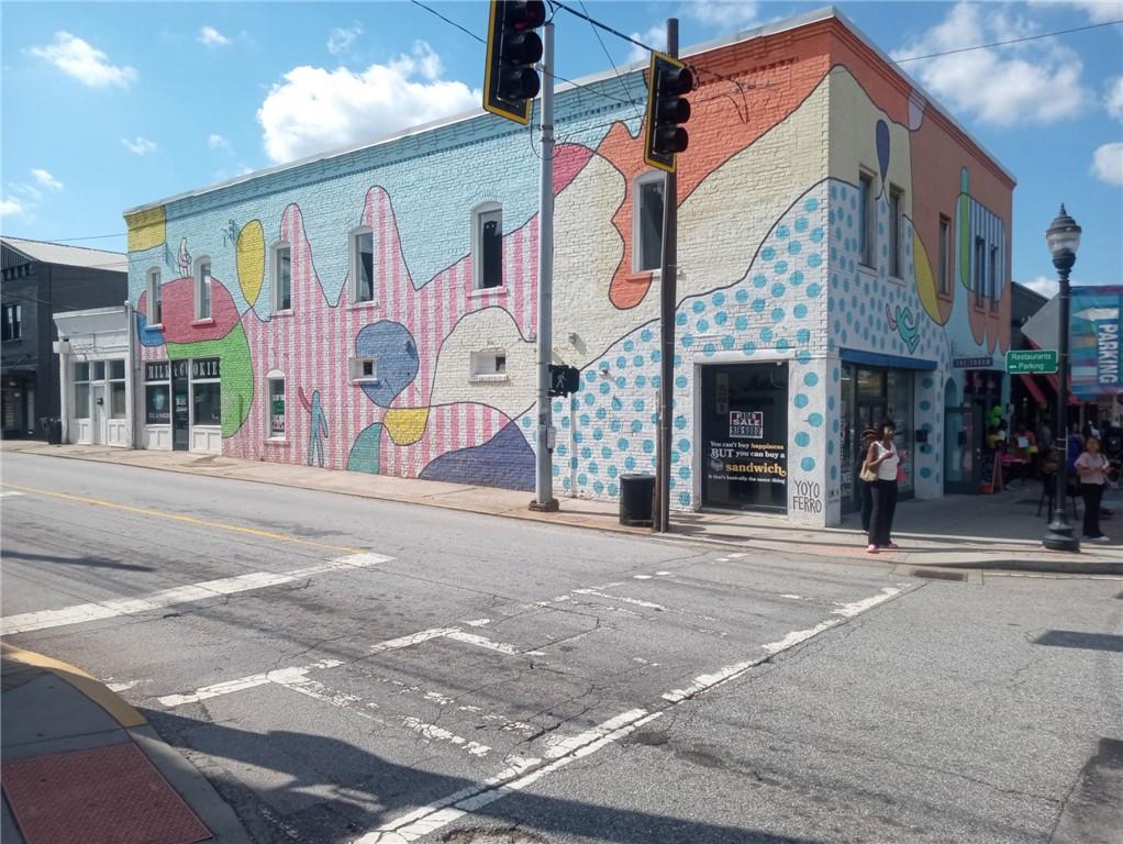 Buy all 4 units or one unit, if approved by closing attorney!!! owner financing!
Best Corner Location for Bar, Restaurant/ Office/Retail/ in College Park
Main building corner of College Park at the signal corner of Harvard Avenue &
Main Street. Across from the historic train station, now city offices.
The complete package includes the corner building for a 2,300 sq. ft. restaurant, bar, or retail shops
office. The 3,000 sq. ft. upstairs unit is divided into 12 offices, conference area, kitchen, and bathrooms.
It was last used for event space/ parties and rentable office suites.
Th T.O.D. zoning district allows for residential use on the 2nd. floor.
The 3rd. unit 1,000 sq. ft. is currently rented by Small Bites Coffee Shop on the right-hand side of the Bodega Bar at $1,800 mo.
The 4th. unit was a barber shop, located on Harvard Avenue. It's the single-story building at 600 sq. ft.
Approximately 6,800 total square feet in all the 4 units combined.
Includes a side area for another separate business location on Harvard Avenue for barber shop, retail, or storage.