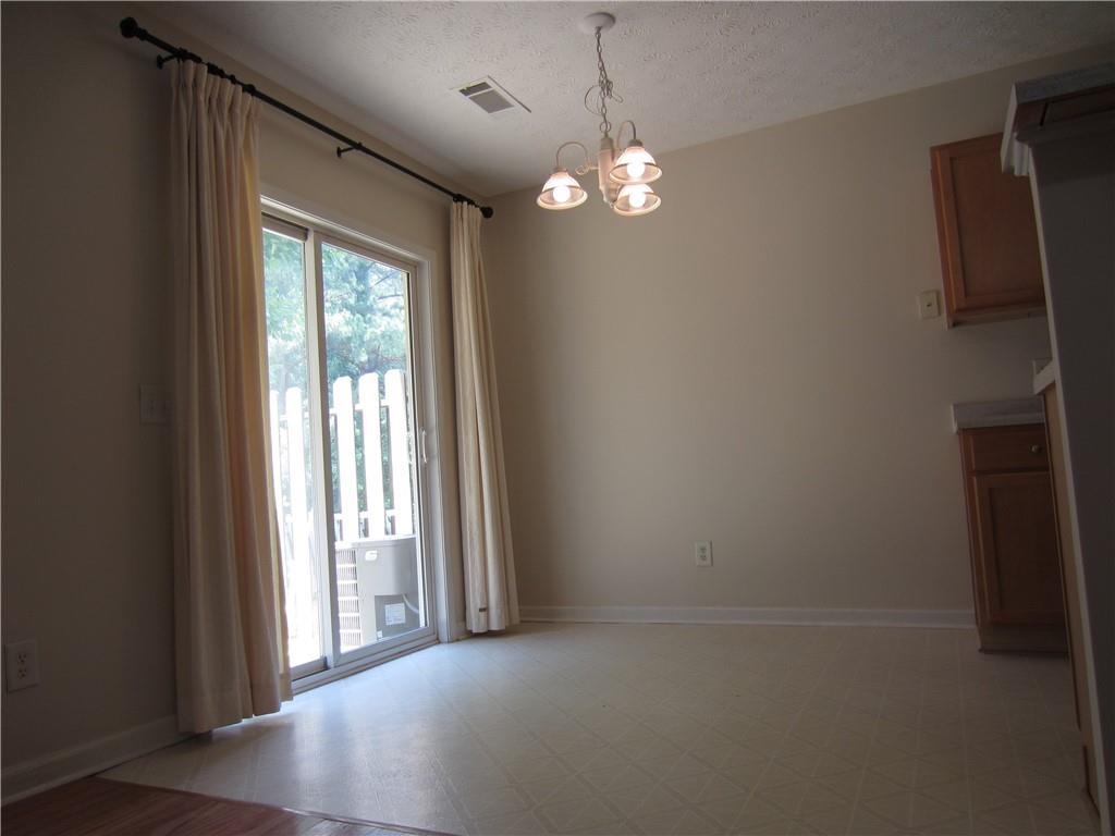Parkview High School District! Spacious and well maintained 2003 townhouse has 3 bedrooms, 2.5 bath rooms. Hardwood floor on main. Formal family room with fireplace. New HVAC in 2021, Bright kitchen and dining room face private back yard. Close to Emory, CDC. Hwy 85, 78. Washer and dryer on site. Small Pets allowed, breeds restricted, pet rent and fee applied. Available on 6/1. This won't last long!