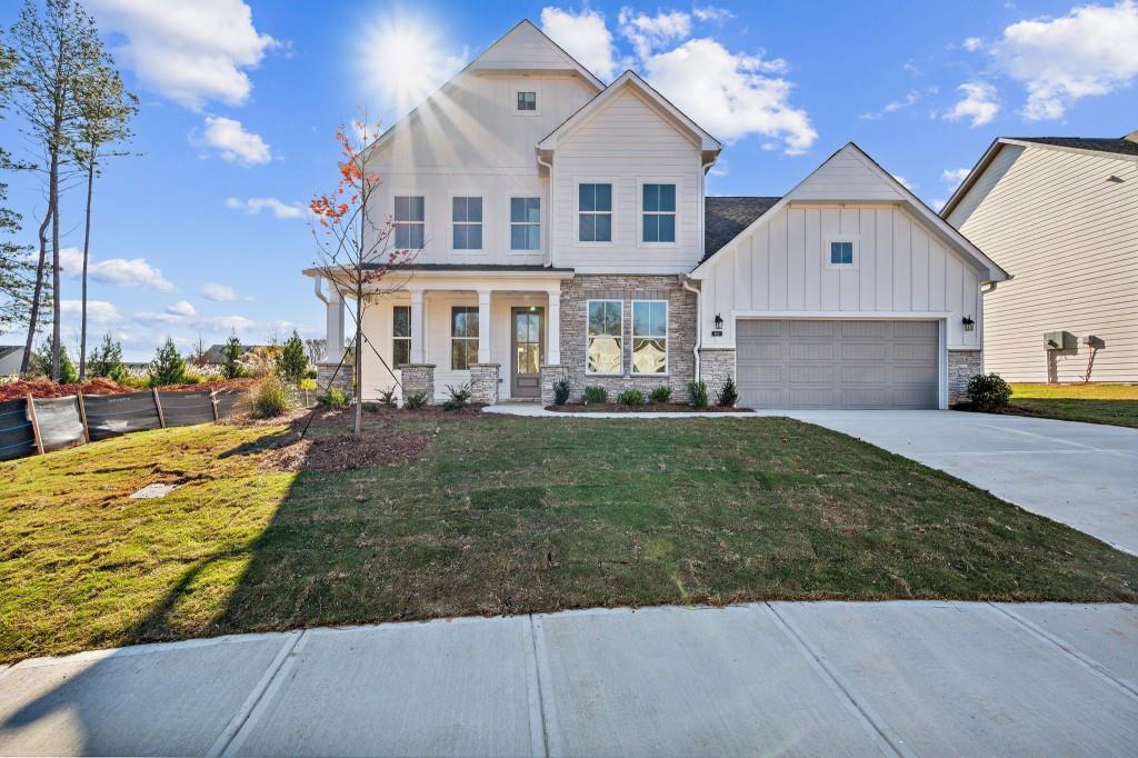 Discover the beautiful Glynn floor plan, a 2-story home offering 2,677 sq. 4 bedrooms, 3.5 baths, and a 2-car garage. This thoughtfully designed home features an indoor fireplace, elegant open railing, and a screened patio for year-round outdoor enjoyment. The open-concept layout includes a spacious living area, dining room, and a chef-inspired kitchen perfect for entertaining.