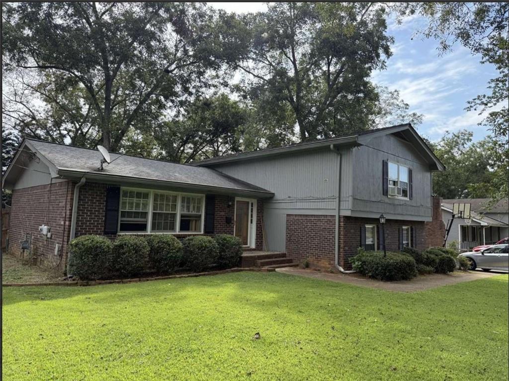Welcome to 2910 Stanton Rd SE in Conyers-a well-maintained, move-in ready home that's perfect for first-time buyers, investors, or anyone looking to secure instant equity at wholesale pricing. This updated 4-bedroom, 2.5-bath home offers a spacious floor plan with a formal living room featuring picture windows, a separate dining room, and a cozy family room with a gas-start brick fireplace. The eat-in kitchen is well-appointed and ready for everyday meals or entertaining. Step outside to enjoy the newer sliding glass door leading to a covered back porch and a huge fenced backyard-perfect for gatherings, pets, or simply relaxing outdoors. Major systems are in great shape: Roof, gutters with guards, and HVAC - 6 years old Hot water heater - 5 years old Well-maintained and cared for over the years With solid systems, a functional layout, and unbeatable pricing, this home is a must-see for value-minded buyers who want to build equity from day one. Don't miss this chance to own a home priced well below market value in a great location-schedule your showing today!