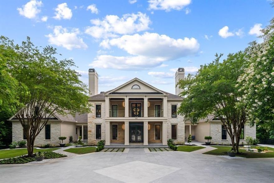 Set at the quiet end of an exclusive cul-de-sac, beyond a secure gated entrance, this spectacular estate offers supreme privacy and unparalleled sophistication on over 2.5 acres of lush, manicured grounds. A brand-new driveway welcomes you into a world where every detail has been elevated   from cutting-edge smart home technology to exquisite, designer finishes throughout. Step into the dramatic two-story foyer and instantly feel the elegance unfold. Flanking the entrance are formal dining and living rooms, each with a stately fireplace and refined architectural touches, perfect for intimate evenings or grand entertaining. The heart of the home is a dream kitchen that blends beauty and function in perfect harmony. Outfitted with dual oversized islands, two Sub-Zero refrigerators/freezers, a professional Wolf range, two dishwashers, a large walk-in pantry, and a sunlit breakfast area, this space opens seamlessly to a serene screened porch, ideal for relaxed morning rituals or twilight cocktails. The main level continues to impress with a large family room with fireplace, a stylish full bar wrapped in glowing translucent onyx stone, two powder rooms, and a generously sized laundry room featuring two washer/dryer sets. Throughout the home, you'll find brand-new hardwood floors, windows, and doors bringing fresh elegance and energy efficiency to every space. Retreat to the luxurious owner's suite on the main level a true sanctuary featuring a cozy fireplace, dual vanities, a soaking tub, oversized walk-in shower, and a spacious boutique-style closet with its own laundry hookup. Upstairs, five additional bedrooms, four full baths, and a versatile bonus room provide ample space for family, guests, or work-from-home needs. The fully finished terrace level is a destination of its own: entertain effortlessly with a second full kitchen, an immersive home theater, a professional-grade golf simulator room, a rejuvenating sauna, and an additional guest suite for extended stays or private living. Step outside into your personal resort oasis. With two new elegant waterfalls, newly renovated pool and spa, while the fully equipped cabana complete with gas grill and built-in refrigerator sets the stage for al fresco entertaining. A lighted tennis court offers play day or night, and the expansive, private backyard connects directly to the Chattahoochee River National Park, offering unmatched access to nature and miles of scenic trails. Meticulously reimagined with over $2 million in recent upgrades and remodeling, this estate has been transformed into a turn-key masterpiece of design and function. The exterior now boasts a striking architectural presence with a sophisticated blend of natural stone, custom brickwork, warm wood accents, and sleek glass finishes, creating curb appeal that's both timeless and cutting-edge. Security and peace of mind are paramount, with state-of-the-art ADT protection and a full-perimeter system of 8 high-definition surveillance cameras. This home is truly ready to be lived in from day one no renovations, no waiting. From top to bottom, every surface, system, and finish is brand-new, delivering the rare opportunity to own a completely remodeled luxury residence in a prime, ultra-private location. This incredible home represents not only unmatched quality but exceptional value for a fully modernized estate of this caliber.