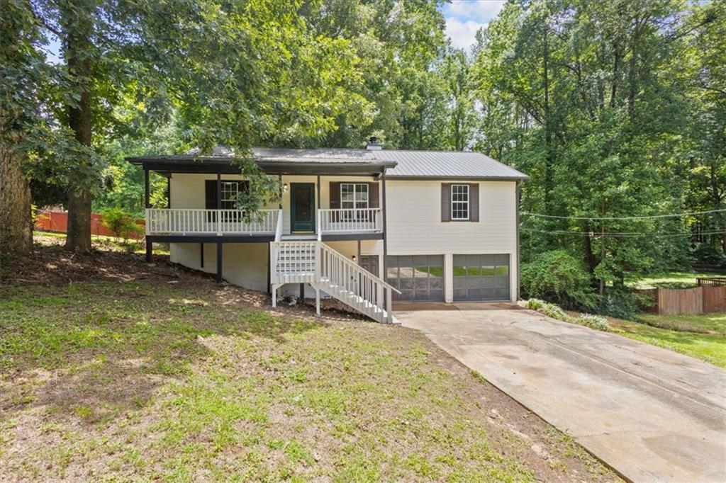 Updated 3BR/2BA Ranch with Bonus Room in Prime Douglasville Location!
Welcome to 6441 Michell Way — a move-in ready 3-bedroom, 2-bath home featuring fresh paint, brand-new luxury vinyl plank flooring, and a flexible layout perfect for modern living.
In addition to the main-level bedrooms and living areas, this home includes a finished bonus room located off the basement/garage — ideal for a home office, guest space, playroom, or media room.
? New LVP flooring and fresh paint throughout
? 3 spacious bedrooms and 2 full bathrooms
? Finished bonus room in basement/garage area
? Full basement with room to expand further
? Quiet, established neighborhood with easy access to I-20, shops, and restaurants
This property is being sold as-is. Schedule your showing today and explore the potential of this well-located Douglasville home!