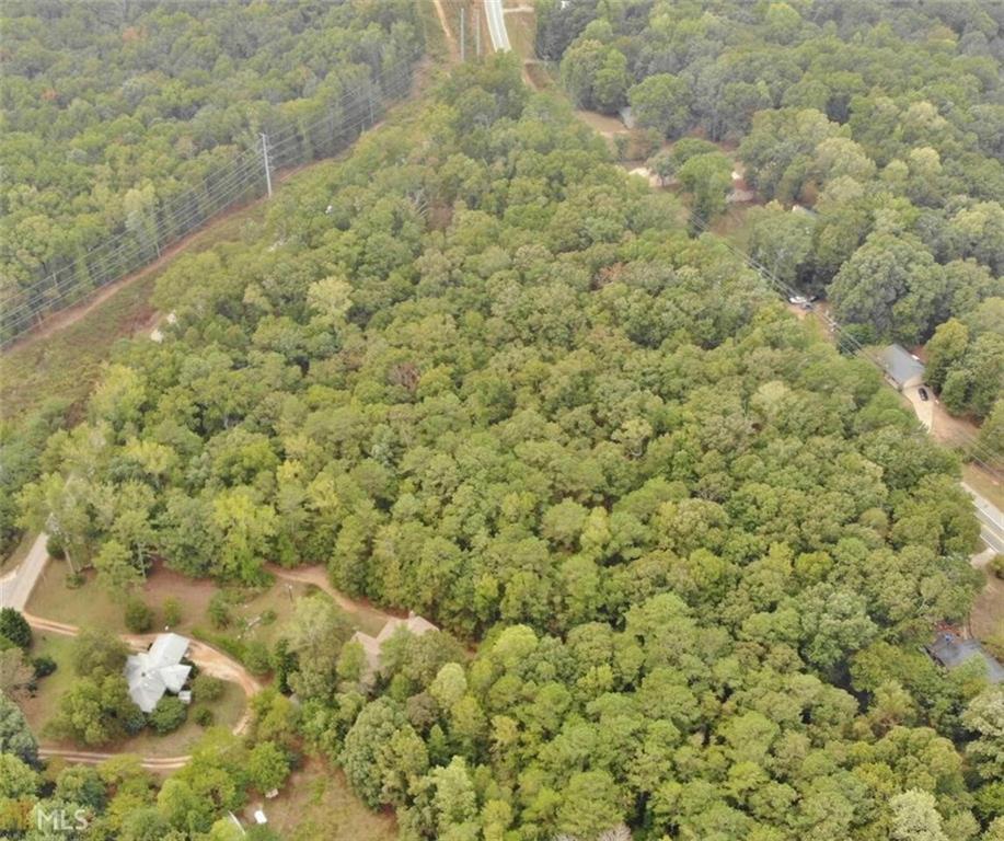 This 5+ acres, located just off Hwy-92, convenient to grocery stores, shopping, Sweetwater State Park, & more. This piece of land sits on the corner of Anneewakee & Chatham Place. Lots of road frontage, wooded, flat, perfection!
