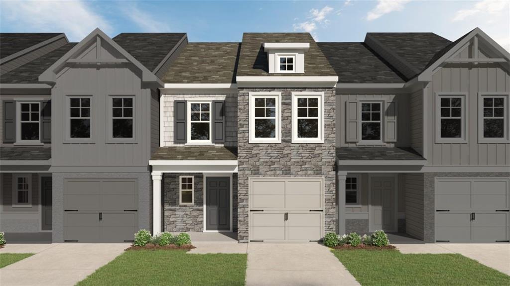 Crape Myrtle-AA. Kerley Family Homes - a smartly designed 3-bedroom townhome with a private garage, located just 1.1 miles from I-75 in the quiet Village Green community. This open-concept layout includes granite kitchen countertops, a spacious island with bar seating, Stove, Dishwasher and Microwave. Your choice of LVP flooring or Carpet on the first floor. Upstairs, enjoy a generous owner's suite with two walk-in closets, a private bath with a double vanity, along with two secondary bedrooms, a full bathroom and a laundry room. Upgrades can be added for an additional cost. HOA covers lawn maintenance for low-maintenance living. Images shown may depict a previously built home with similar features. Actual home is TO BE BUILT with all standard features.
