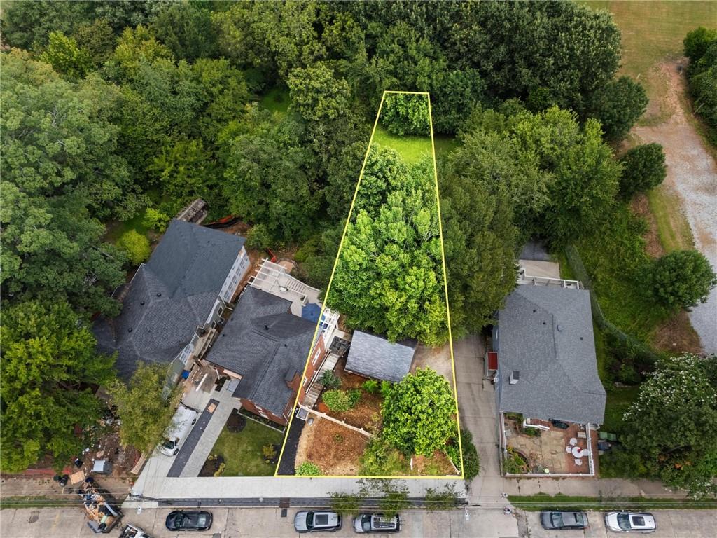 Buildable Residential Lot – Inman Park
Rare opportunity to own a prime buildable lot in the heart of Inman Park, one of Atlanta’s most desirable neighborhoods.
Excellent Location: Situated on one of the best streets in Inman Park with easy access to Moreland Ave, I-75/85, and walking distance to The Beltline, Little 5 Points, the Edgewood Retail District, MARTA, and all the shops, dining, and parks the neighborhood is known for.
Ready to Build: This property has received City of Atlanta Technical Panel approval and is now ready to submit for building permits. Plans are approved by the Inman Park Neighborhood Association and by the City of Atlanta’s Urban Design Commission. Lot includes a new survey, approved site plan, and architectural house design. Sewer connection is in place.
Lot Features: Deep lot with room for a large yard, plus an intermittent stream adding natural charm and privacy.
This centrally located lot is shovel-ready for your custom dream home in one of Atlanta’s most vibrant and historic communities. There is currently a garage on the property.
