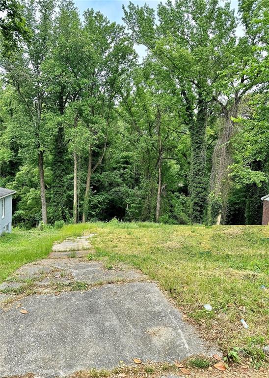 Extra Large Buildable Lot in Hammond Park. A Very Rare Find..  The property's Land Survey comes with the sale of this property. Feel free to walk the property at any time. No sign on property. Finding such a large lot within the city limits is very rare. There are several new developments currently underway in this area. The Property is close to Hartsfield Jackson International Airport and Downtown Atlanta. Call or text with any other questions.
