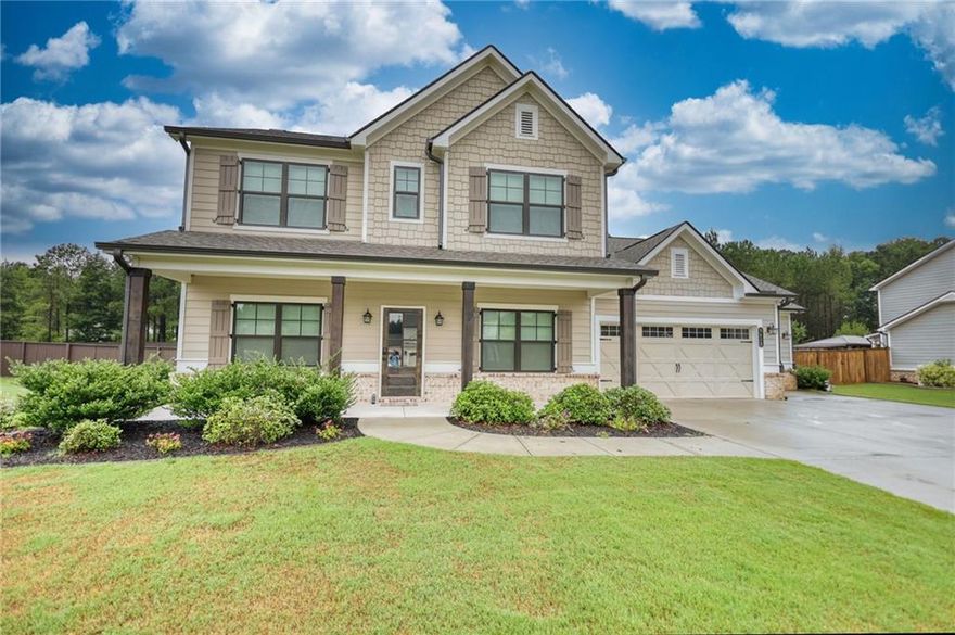 Come see this stunning move-in ready 4-bedroom, 3-bath home with a 3-car garage on nearly an acre, built in 2021! Just 7 minutes to downtown Monroe and within 30 minutes of Madison, Covington, Athens, and surrounding cities. Located in a desirable school district with both public and private options. This home offers the perfect blend of style and functionality. The beautifully designed kitchen features quartz countertops, a gas cooktop, wall oven, walk-in pantry, and plenty of space for cooking and entertaining. A spacious main-level flex room is ideal for an office, playroom, or optional 5th bedroom. Enjoy the luxury of two Owner's Suites--one on the main level and another upstairs--perfect for multi-generational living. Relax in your private backyard by the gas-starter fireplace and enjoy the efficiency of a gas water heater, along with the convenience of a Culligan water filtration system. The large lot also includes a 10x12 Tuff Shed for added storage. This home is move-in ready, with an option to purchase partially or fully furnished. Don't miss the chance to own this gorgeous home--schedule your showing today!