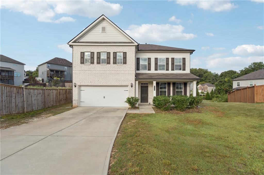 A Wonderful Place to Call Home!
Welcome to this beautifully crafted 4-bedroom home in the prestigious Tiberon community. Recently built and thoughtfully designed, this residence offers modern elegance with an inviting atmosphere.
Step inside and be greeted by soaring 10-foot ceilings and abundant natural light. The heart of the home is the spacious kitchen and family room, complete with a cozy fireplace. The kitchen features a generous island, a walk-in pantry, and seamless flow to the family room—perfect for everyday living and entertaining. Expansive windows overlook the flat, private backyard, ideal for gatherings or play.
A separate dining room provides a lovely view of the quiet cul-de-sac, while a main-level bedroom with full bath offers flexibility for guests, a home office, or playroom.
Upstairs, discover a second family room retreat. The luxurious primary suite impresses with a spa-like bath boasting a soaking tub, an oversized double shower with seamless glass doors, dual vanities, extra storage, and a massive walk-in closet. Two additional bedrooms each include en-suite baths and generous closet space.
Practicality meets comfort with ample storage throughout. Enjoy community amenities within walking distance, including the pool and playground. Located near top-rated schools, this home is just 15 minutes from Cumming, Ball Ground, and the Outlet Mall, and only 30 minutes from Alpharetta.
This exceptional property combines convenience, comfort, and style—truly a place you’ll be proud to call home.