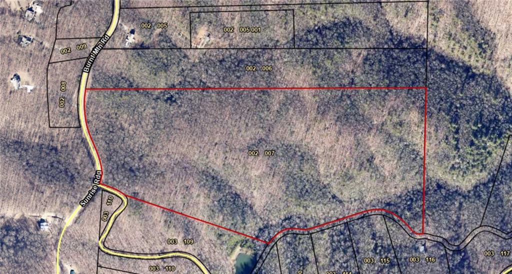 74+ acres total. 2 parcels, must be sold together. One lot is 57.15 acres, the other is 17.01, according to public records. Wooded lot with mostly hardwood trees throughout, the land is not in a conservation program at this time. Immediate development available. There are several places to put drive in to property. One near Scenic Ln, two off Burnt Mountain Rd. Parcel numbers are as follows: 002 006 & 002 007. Dawson County, close to the Pickens county line