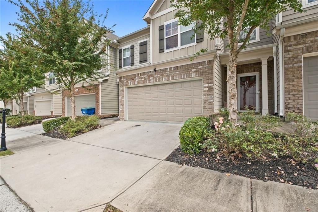 Welcome to Cascade Place! This charming 3-bedroom, 2.5-bath townhome offers an open and spacious floor plan designed for modern living. The bright family room with a cozy fireplace flows seamlessly into the stylish kitchen, complete with a large island, stainless steel appliances, and plenty of space for entertaining. Upstairs, the owner’s suite features a double vanity, soaking tub, and separate shower, with two additional bedrooms and a convenient laundry room nearby.
Built in 2017, this home also includes a two-car garage, high ceilings, and thoughtful finishes throughout. Perfectly located just minutes from Camp Creek Marketplace with easy access to I-20 and I-285, you’ll enjoy both comfort and convenience in one of Atlanta’s most desirable spots.