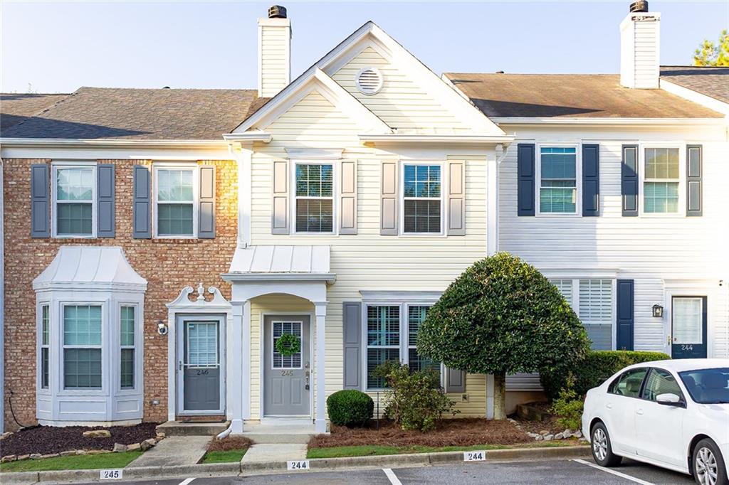 Beautifully updated townhome featuring 2 beds + 2.5 baths - the perfect blend of modern updates with cozy charm. Step into the heart of the home—an upgraded kitchen featuring NEW countertops, NEW white cabinets, NEW stylish backsplash, NEW deep farmhouse-style sink and Updated Appliances. Whether you're hosting friends or cooking a quiet meal at home, this kitchen is designed to impress. Enjoy peace of mind with a BRAND-NEW HVAC system, NEW energy-efficient windows, and NEW sliding glass door. The water heater was replaced in 2023, adding even more value and reliability to this already move-in-ready home. Step outside to your private garden, ideal for growing vegetables, herbs, or creating a tranquil retreat, perfect for morning coffee or evening unwinding. Two assigned parking spaces offer convenience and ease every day. Abundance of Natural Light throughout. Don’t miss this opportunity to own a lovingly updated townhome that offers low-maintenance living with modern upgrades and outdoor possibilities.