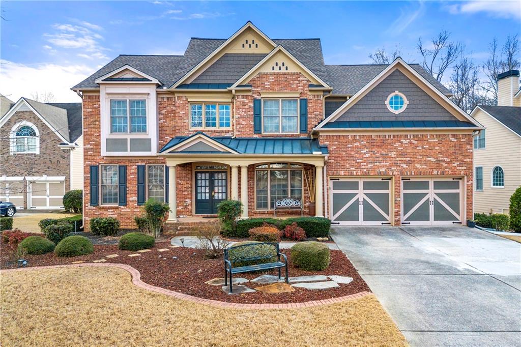 Stunning Home in Marietta’s Cheatham Hill School District – A Perfect Blend of Space, Comfort, and Style
Welcome to this exceptional home offering nearly 6,000 sq. ft. of living space in the heart of Marietta, GA. Located on a sprawling 0.59-acre lot, this property provides a unique opportunity for multi-generational living, entertainment, or simply enjoying the spacious design and thoughtful layout.
From the covered front porch, step through grand French doors into a welcoming two-story foyer. The main level boasts a flexible formal living room—perfect as a home office—paired with a large dining room for hosting family gatherings. The heart of the home features an open-concept Great Room with a gas-starter, wood-burning fireplace, flowing seamlessly into a bright breakfast area and spacious kitchen. The kitchen is equipped with granite countertops, maple cabinetry, a walk-in pantry, and a large island with breakfast bar—ideal for casual dining and entertaining.
The main-level bedroom suite provides convenience and privacy, making it ideal for guests or as an in-law suite. Upstairs, you’ll find 4 generously sized bedrooms, including a primary retreat with a sitting area, tray ceiling, spa-inspired bath with soaking tub, separate shower, and walk-in closet. The Jack-and-Jill bathroom and second-floor laundry room add functionality, while the oversized media room offers endless possibilities as a playroom, home theater, or additional living space.
The finished basement is a standout feature, offering its own full kitchen, breakfast area, living room, and two additional rooms for use as bedrooms, office space, or storage. With a private entrance and full-length patio, it’s perfect for extended family or guests.
Additional Features:
Well-Maintained: Roof fully replaced 4 years ago; water heater updated within the last 3 years.
Beautiful Landscaping: Large yard with garden area, ideal for outdoor living.
Prime Location: Located in the highly sought-after Cheatham Hill school district, close to shopping, dining, and parks.
This home combines thoughtful updates with timeless design, offering plenty of space for families of all sizes. It’s been meticulously maintained and built to last, ready for its next owners to enjoy for years to come. Schedule your private showing today to see all this incredible property has to offer!