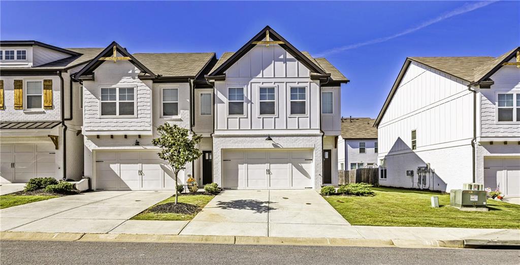 Immaculate End Unit Townhome – Better Than Most!
Having toured many condominiums, this particular unit truly stands out from the rest. Only four years young, this adorable end unit is exceptionally well-maintained and offers a bright, cheerful ambiance with an open-concept layout and abundant natural light throughout.
From the moment you step inside, you're greeted by spotless interiors, luxury vinyl plank flooring, and tall white cabinetry that pairs beautifully with gleaming countertops. The kitchen is equipped with all stainless steel appliances, including a gas range and refrigerator, making it both stylish and functional.
The cozy breakfast area seamlessly connects the kitchen and family room, offering a perfect view of the private, fenced backyard—ideal for relaxing or entertaining.
The spacious primary suite features a generous walk-in closet, while the luxury ensuite bath includes a glass-enclosed shower and elegant finishes that add a touch of sophistication.
Located in a desirable community with HOA amenities including a swimming pool, tennis courts, and a playground, this home offers both comfort and convenience. Just minutes from downtown Winder, you’ll enjoy easy access to charming shops, restaurants, and local attractions.
This special unit is a must-see—don’t miss the opportunity to make it yours!