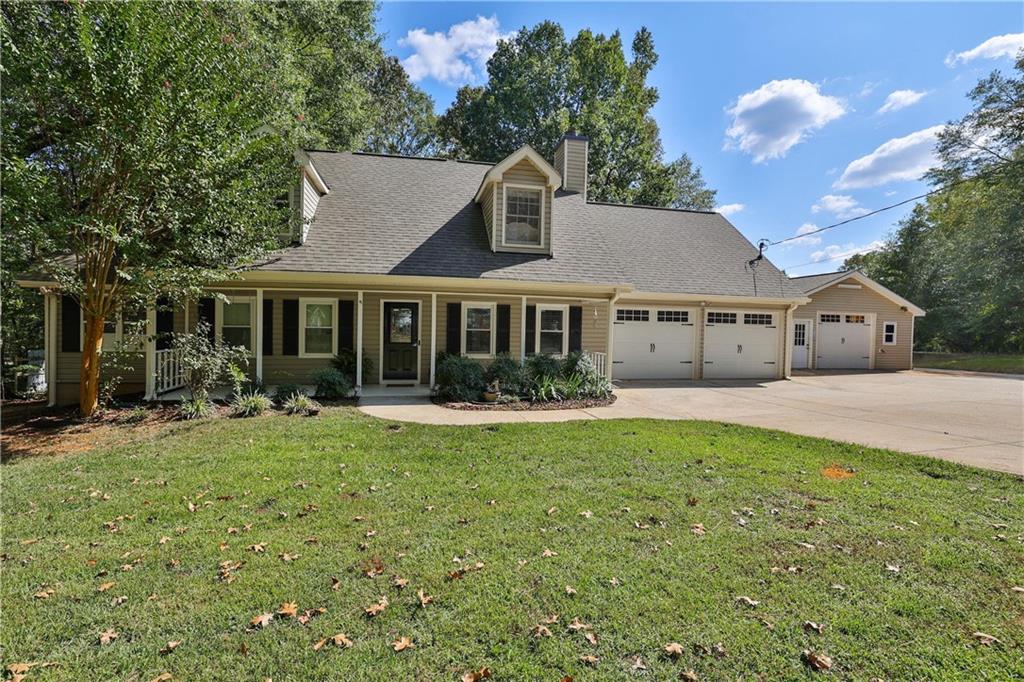 Bring your farming or homesteading dreams to life on 3 acres! This property comes with a detached garage, chicken coop for 15–20 hens, and water/power hookup for a camper. The home features a spacious master suite with barn doors, spa tub, and walk-in closet, plus a cozy family room with stone fireplace, granite kitchen, sunroom, and huge laundry/mudroom. Outside, enjoy a massive deck with firepit and gated yard. Upstairs offers 3 bedrooms, while a separate 1-bed/1-bath guest suite provides rental or farmhand space. Roof and well pump recently updated—ready for animals, gardens, or your next project!