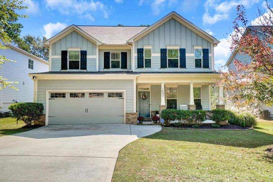 Welcome home to 1697 Dyeson Road in Marietta; a beautifully maintained 4-bedroom, 2.5-bath home built in 2016 that perfectly blends modern comfort with timeless style. The inviting floor plan features a spacious family room with a cozy fireplace and open views to the kitchen, where you'll find crisp white cabinetry, granite countertops, stainless steel appliances, a walk-in pantry, and a large center island ideal for gathering and meal prep. A separate dining room showcases charming board-and-batten detailing, adding character and warmth to the main level. Upstairs, all four bedrooms offer generous space, including a serene primary suite with an oversized walk-in closet featuring upgraded organizers, dual vanities, a soaking tub, and a separate shower. Step outside to enjoy the expansive, flat, fenced-in backyard   complete with an extended concrete patio, newly planted trees, and plenty of room for play or entertaining. Thoughtful updates include a new HVAC system (May 2024), upgraded light fixtures and ceiling fans, fresh interior paint in most rooms, and added backyard fencing for privacy. Located near parks, schools, and all the conveniences of Marietta living, this move-in ready home offers style, comfort, and value in one exceptional package.