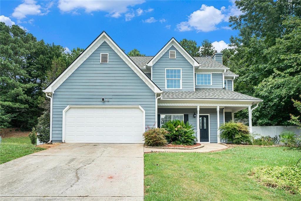 Come experience this cozy 4 Bed/ 2.5 Bath Farmhouse at the top of the cul-de-sac. You'll love the wrap around front porch as you enter the two-story foyer that leads to a great room with a gas fireplace. The open floor plan flows into the kitchen and there's also a formal dining room for family gatherings or entertaining your friends. The entire main floor shines with new LVP flooring and new paint throughout both floors. The kitchen has granite tile counters, and sandstone backsplash, with brand-new SS oven and dishwasher. There’s plenty of cabinet space including a butler's counter adjacent to the dining room.
Upstairs, escape to your private primary suite with a tray ceiling, two generous walk-in closets, and a spa-like ensuite bathroom featuring double vanities, shower, and a luxurious soaking tub. Three other generous bedrooms and a full bath complete the second floor. You’ll enjoy gatherings on your covered back porch and private fenced yard with easy to maintain hardscapes and artificial turf and a convenient storage shed. The roof is less than a year old and the HVAC and water heater under 10 years old plus the seller is adding a one-year home warranty on all appliances, plumbing, and electric for peace of mind.
Best of all, this home sits in a top-rated school district, has no HOA, and is just minutes from Suwanee Town Center, parks, and shopping. Don’t miss your chance to own this beautifully updated farmhouse in one of the most desirable areas around!