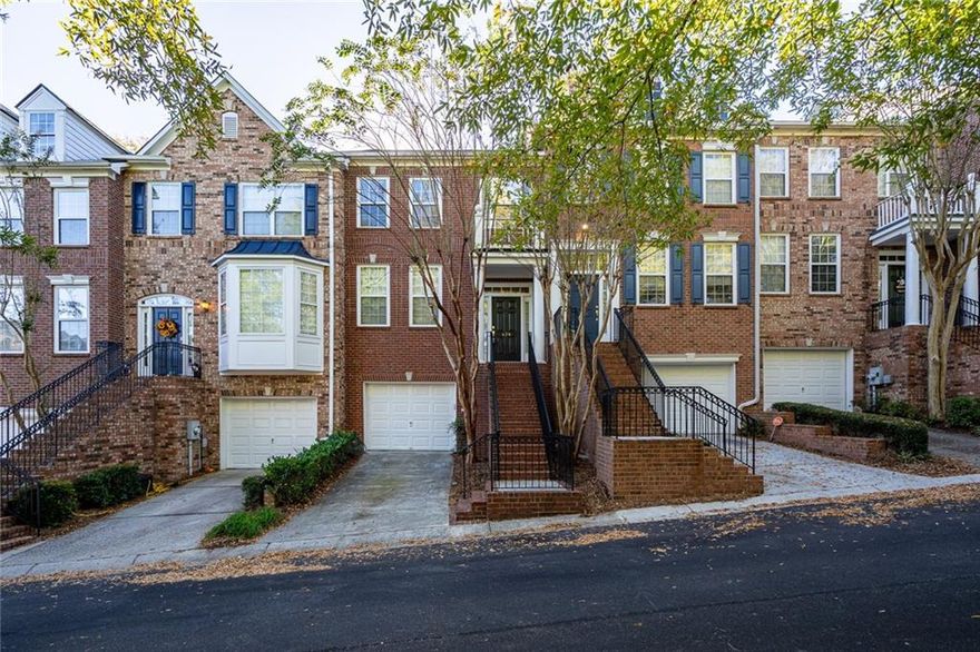 Beautiful townhome in a prime Smyrna location, just minutes from The Battery at Truist Park, I-285, shopping, and dining. The well-designed kitchen features granite countertops and opens to a spacious family room complete with built-in bookshelves and a cozy fireplace.

The oversized primary suite includes a walk-in closet, garden tub, and separate shower. Enjoy outdoor entertaining on the large back deck overlooking a private wooded area. The finished terrace level includes its own full bathroom—perfect for a guest suite, home office, or bonus space.
