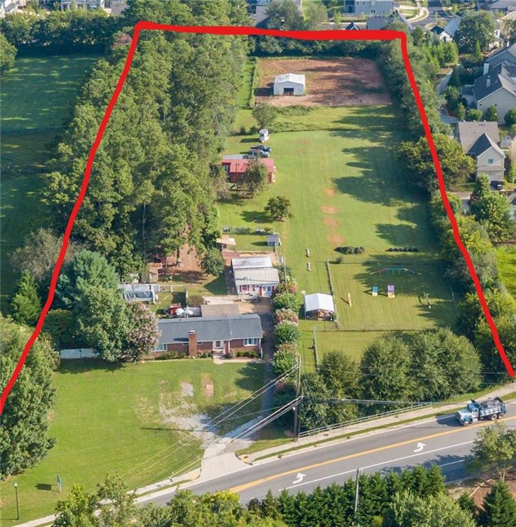 Attention Mixed Use and Commercial Developers! Don't Miss Out On 5 Acres Of Prime Property located In The City Of Milton. Zoned T4. There Is So Much You Can Do With This Property. Mixed Use Buildings With Condos For Sale Above and Restaurant/Retail/Office Below Are Permitted. Freestanding Retail, Restaurant, School, Office And Much More Are Permitted. Residential Development Is Permitted Too With Single Family Homes Or Townhomes. Up To 25 Homes Are Currently Allowed With A Option For Higher Density. 55+ Communities, Hospice and Assistant Living Are Permitted. Level Lot That Is 95% Cleared. All Utilities Are Available.