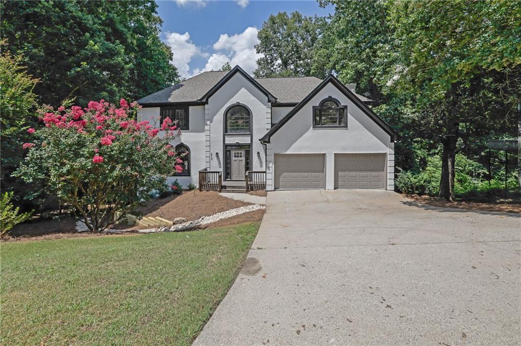Check out this beautifully renovated traditional home in the Lexington neighborhood—offering tons of space, designer touches, and move-in-ready finishes!
Step inside to a gorgeous two-story foyer with light oak hardwoods, flowing into open living and dining spaces filled with natural light. The remodeled kitchen stuns with white cabinets, sleek stainless appliances, quartz countertops, and a cozy breakfast room overlooking the wooded backyard.
The large family room with black brick & shiplap fireplace opens to an oversized party deck—perfect for gatherings and relaxing evenings. Upstairs, the primary suite is a true retreat with a spa-like bath featuring a soaking tub, double vanities, walk-in shower, and a spacious closet. Three additional bedrooms, a large hall bath, and upstairs laundry complete the upper level.
Enjoy the unfinished basement for future expansion, low-maintenance backyard, and updates including new HVAC, fresh paint, new lighting, new carpet, and a young roof.
Minutes from shopping, dining, and top-rated schools in Marietta—this is the one you’ve been waiting for!