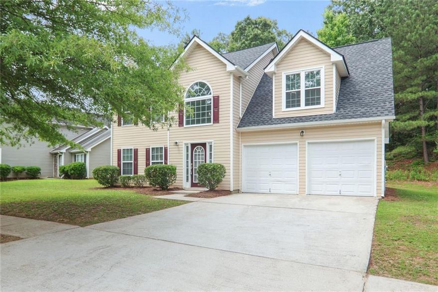 Welcome to this stunning two story home with updates throughout.  New roof, paint, flooring, stainless appliances, lighting and more. Step into the two story entry foyer; where you are greeted by a spacious living room, with fireplace, that flows into the dining room.  Dining room features crown molding and entry into  a spacious kitchen. Perfect for entertaining, offering an abundance of counterspace, the kitchen offers a sizable breakfast area. Kitchen updates include: granite counters with backsplash, white cabinetry, stainless double sink and brand new stainless appliances.  Upstairs you will find three generously sized bedrooms and two full baths.  The primary bedroom features an oversized walk-in closet and fully updated bath.  Each bathroom includes tiled showers, new vanities, new faucets and new lighting. Automatic garage door openers, blinds at all windows and ceiling fans are included. Neighborhood amenities include a swimming pool, club house and tennis courts.  This property is move in ready.