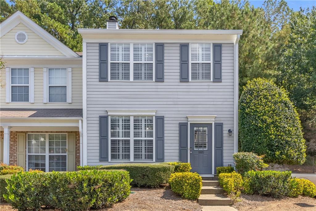 This beautiful 2 bedroom, 2.5 bath corner end-unit townhome in the Stoneridge community offers top-rated schools, wonderful outdoor amenities, and an unbeatable Alpharetta location just minutes from Avalon, Downtown Alpharetta, and GA-400. Recent updates include a completely repainted interior, new waterproof laminate flooring throughout including the stairs, a brand-new HVAC system with Core digital thermostat installed in June 2024, and a new stove range. The spacious kitchen with gas appliances, plantation shutters throughout, and a cozy fireplace with gas starter create a warm and inviting atmosphere. Upstairs, both bedrooms are generously sized, and the washer and dryer are conveniently located on the second floor. Outdoor living is a highlight with a private fenced backyard, patio, and direct access to two assigned parking spaces. The backyard also includes a storage room for added convenience. Community amenities include a pond, green space, and a walking path with direct access to the Big Creek Greenway. Stoneridge is also located right next door to Alpharetta High School.