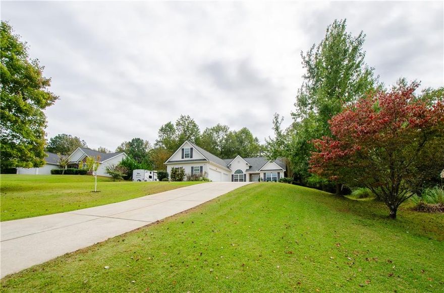 Beautiful Ranch Home On A Large 1.1 Acre Private Lot. Freshly Painted And Hardwood Flooring Throughout The Home Give The Home A Fresh, Airy Feel. The Family Room Features High Ceilings And A Fireplace. The Kitchen Has White Cabinetry And Granite Countertops. Dining Room Is Currently Used As A Sitting Room But It Can Fit A Full Sized Dining Room Set. Generously Sized Master On Main Suite Boasts A Large Walk-In Closet With Built-Ins. Two Additional Bedrooms And A Huge Bonus Room Offer Plenty Of Living Space. The Yard Is Very Large And Fenced. Three Car Garage! No HOA!