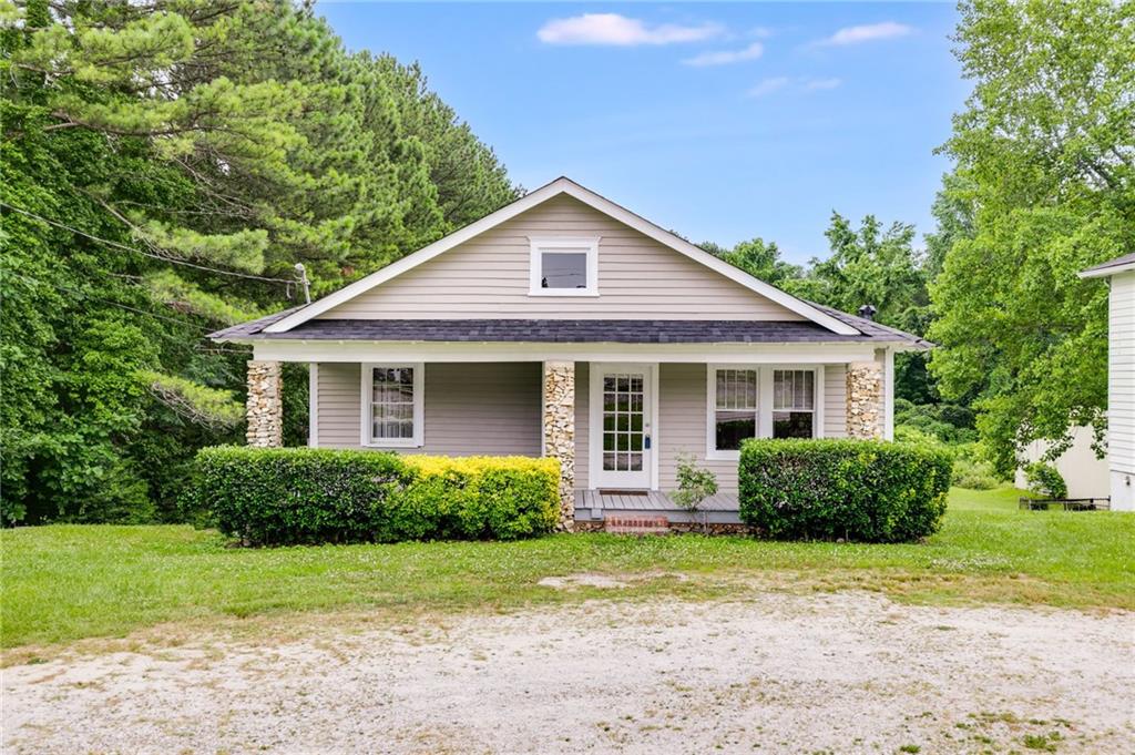 Welcome to this charming commercial property on over half an acre! Featuring a functional galley kitchen with freshly painted cabinets,
new flooring in utility areas, and beautiful real hardwood floors throughout. Enjoy peace of mind with a new roof, new HVAC system, and a
5-year-old water heater. This cozy space offers the perfect blend of vintage character and modern updates. The expansive yard provides
ample space for various business activities, from gardening to outdoor events. Don't miss this opportunity to own a versatile property with
so much to offer. Must see! Sold as is.