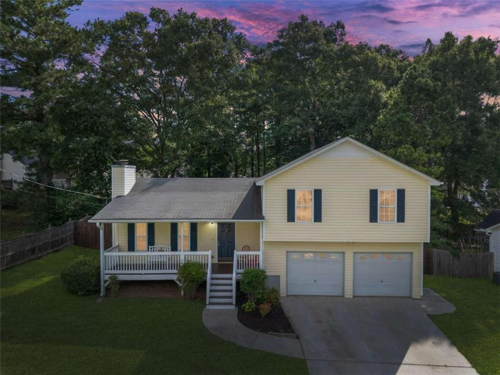 Ready to move in. this adorable 3BR/2BA Split-Level Home! This updated home features beautiful, refinished hardwood floors on main, a cozy family room with fireplace, and a bright kitchen, lvp floors in all bedrooms, tiled owners en-suite with tub/shower combo, enjoy a charming front porch and a back deck overlooking a fenced yard, perfect for entertaining or relaxing. Move-in ready and priced to sell quickly. Don't miss this one!
