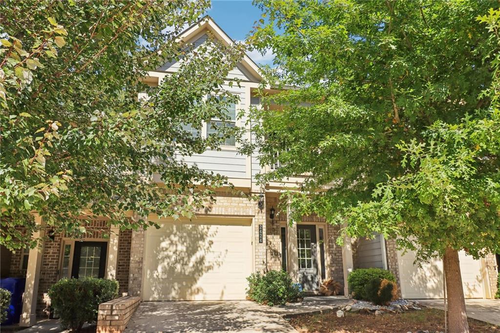 This modern townhouse, built in 2018, offers contemporary living with peace of mind with 2 bedrooms and 2.5 bathrooms, perfect for comfortable living. Featuring all systems just 6 years old, you’ll enjoy the efficiency and reliability of newer HVAC, plumbing, and electrical setups. The back bedroom provides a quiet, private retreat with serene views of the treeline, ensuring a peaceful atmosphere. Located off the main road, you'll enjoy the benefits of a quiet neighborhood with no through traffic. The recently updated backyard and deck provide an inviting outdoor space, perfect for relaxing or entertaining. Easy to show, this move-in-ready townhome is a must-see!