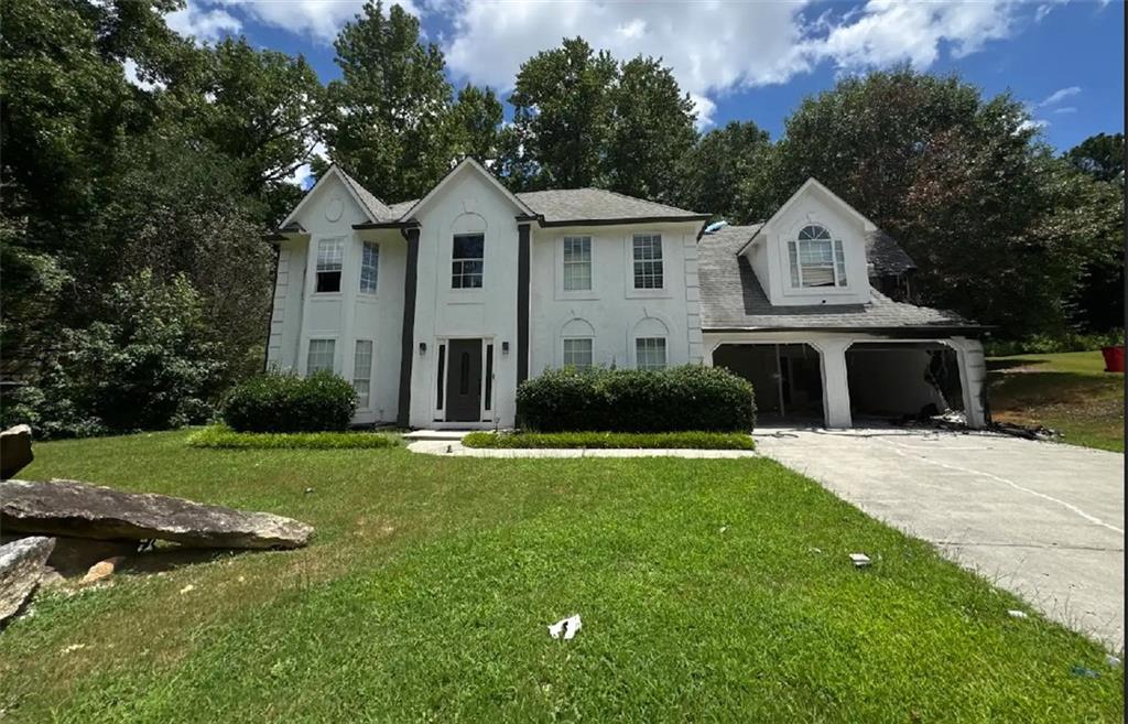 Opportunity awaits with this property located in a quiet neighborhood within a reputable school district, offering a peaceful setting with wooded views and convenient access to healthcare, shopping, dining, and entertainment, and just minutes from grocery stores, yet tucked just outside the hustle and bustle.
This home was unfortunately involved in a fire and is being sold AS-IS, presenting a rare chance for the right buyer to rebuild or tear down and start fresh on a great lot. With a slab foundation, there may be potential to utilize the existing foundation, depending on buyer evaluation. The lower level experienced less damage, and whether portions are salvageable is at the discretion of the buyer. Whether you're an investor looking for your next project or a homeowner with a vision for creating a custom build in an established community, this property offers strong potential and a great location to match.