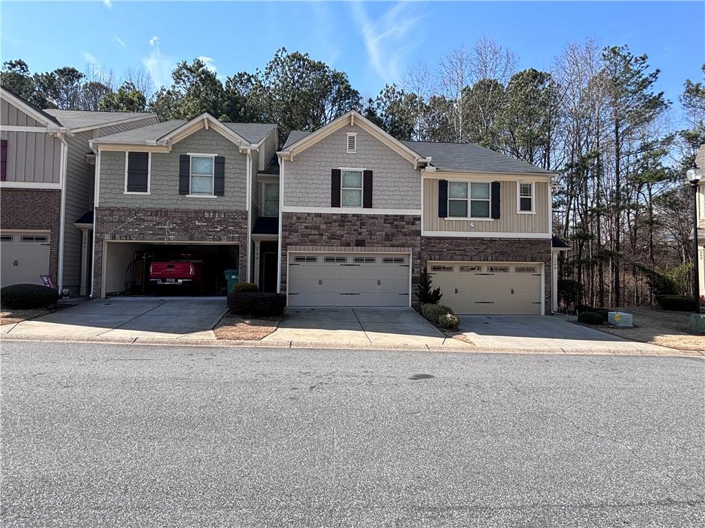 This property is occupied until 6/1. Please give at least 24 hours notice before attempting to see this property in person. Showing window from 10-4 Monday-Friday.
Beautiful 3-bedroom, 2.5-bathroom townhouse available for rent at 203 Townview Dr in Woodstock. Built in 2016, this spacious end-unit boasts 1,772 square feet of living space and backs to a private, tree-lined buffer, offering a rare sense of seclusion. Enjoy upgraded stainless steel appliances, a fireplace perfect for cozy evenings, and like-new hardwood LVP flooring throughout the open living spaces. The kitchen features stained custom cabinets, a built-in microwave, gas cooking, a walk-in pantry, and a center island with a four-seater breakfast bar, all open to the family room. The oversized master suite provides a relaxing haven with a walk-in closet, separate vanities, and an amazing, oversized bathtub. This meticulously maintained home also includes a Ring doorbell security system, a washer and dryer, and access to a community pool. Located in a desirable Woodstock neighborhood with an excellent school system, this property offers easy access to multiple trendy metro areas, shopping, restaurants, and entertainment. This is a low-maintenance lifestyle opportunity you won't want to miss!