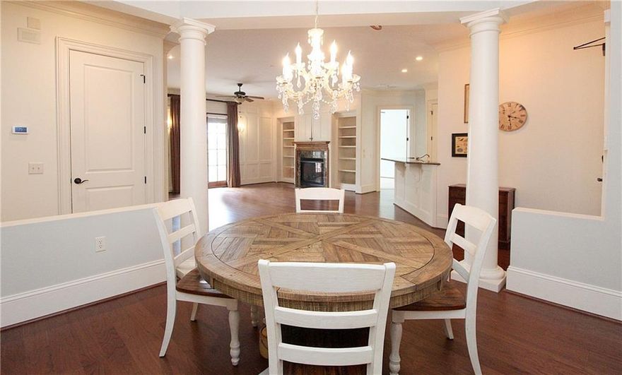 Come see this gorgeous updated single level living 3 bedroom, 3 bath condo. Walk to Marietta Square! Quiet street and a secure, prestigious building in a great location. Beautiful built-in shelving, crown moulding, and hardwood flooring. Enjoy entertaining in the rooftop common room with a large deck and beautiful views of Kennesaw Mountain. Units rarely come available in this beautiful federal style building. Come see unit #208 today! Priced to Sell!