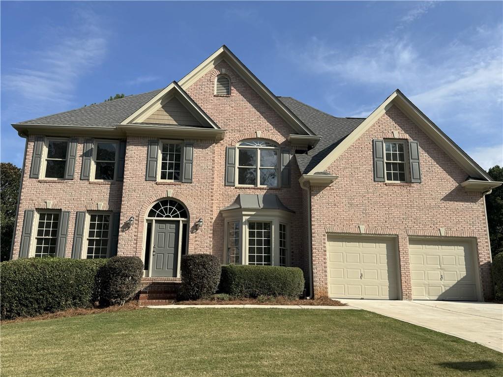 Move in ready! Beautiful house in Johns Creek district with all awards winning public schools. Open floor plan with two story living room. 6 beds and 4 full baths. Freshly painted, renovated kitchen with new cabinets and quartz countertops. Hardwood floors on main. New carpets. Lawn services included. Convenient to community club house / tennis / swimming/ basketball / playground.