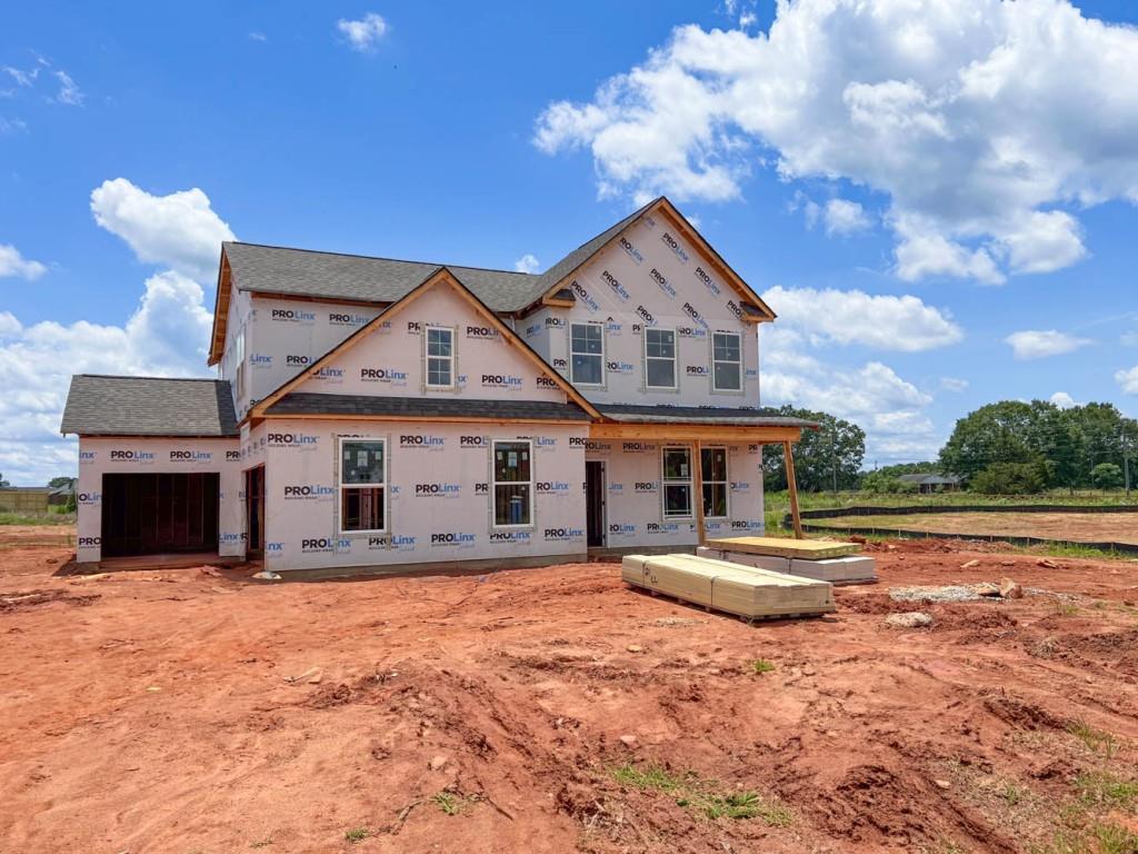 The Everglade plan built by My Home Communities. Quick Move-In! This master on main home sits on 2.126 ACRES with a 3 car side entry garage and has an estimated completion of July/August 2025. Cotton Creek features 22 thoughtfully designed home sites, providing homeowners with beautifully crafted floor plans in a peaceful, small-town setting. This development offers the perfect blend of tranquility and convenience, making it an ideal location for anyone seeking comfort and modern living in the Good Hope and Monroe area. Quartz Countertops and Upgraded Flooring throughout, Gourmet Kitchen and Designer Primary Bath Suite, Craftsman Trim Work and Crown Molding, Luxury Lighting and Plumbing Accents, your home will have it all, more upgrades and crafted selections than I can list. Agents and buyers are welcome to tour our decorated model home. Seller offers up to $5,000 towards closing costs OR ask about our rate buy-down options with binding contract by 06/30/2025 *Virtual tour is an example of the floor plan and not of the actual listing*