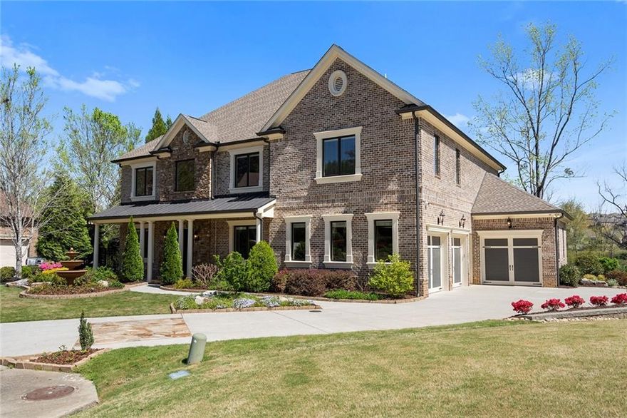 Spectacular Custom-built home in ST MARLO COUNTRY CLUB! Amazing large lot perfectly situated on a cul-de-sac.  This beautiful mature lot offers more greenspace than any other lot in St Marlo. Magnificent Grand Foyer is flanked by a banquet sized Dining Room with butler's pantry and Formal Living Room/Library. The Owner has spared no expense on the beautiful Chef's kitchen featuring custom built cabinetry, All Stainless-Steel Viking appliances, oversized center island with exotic granite which overlooks the stunning 2-Story Keeping Room featuring coffered ceiling and grand fireplace flanked by beautiful built-in bookcases. Spacious bedroom on the main could also be used as an office or flex space.  Upstairs, you are greeted by a welcoming landing area that leads to the large Master Suite with luxurious spa bath and the most amazing closet that you have ever seen! This closet is almost the size of the master suite. It's like a closet in a closet with built-in storage with doors, drawers, folding island and more for the finest of clothing. All additional bedroom up boasts en-suites with walk-in closets. The laundry center is located on the main level along with plenty of build-ins and adjacent to a fantastic mudroom. This gorgeous home features upgrades galore including exquisite millwork, hardwood floors throughout the main and upstairs.  The terrace level has porcelain tile throughout, a bedroom with built-ins and full bath would make a great in-law suite or teen suite, also, a powder room, designated bar area with built-ins and fridge.  A tankless water heater supports the whole house as well as surround sound throughout, and a mega security system with cameras on each corner of the home which can be seen from wherever you are.  The insulated garage has ultra-quiet garage door openers and nice epoxy finish. So many extras and attention to detail.  This house will not disappoint.