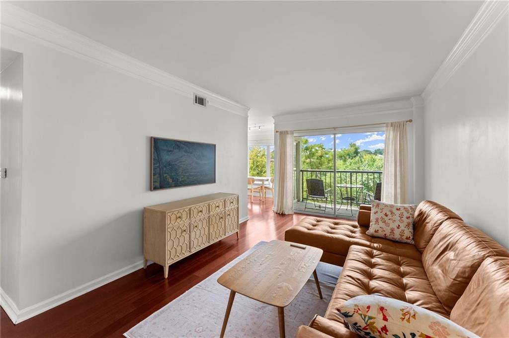 Welcome to Parc Vue, where city living meets nature just steps from the vibrant and scenic Piedmont Park. This bright and airy 2-bedroom, 1-bathroom home offers the perfect blend of convenience, style, and tranquility in the heart of Midtown Atlanta. Located in one of the best ZIP codes to live in America (2025 Niche Best Places to Live), it’s easy walking to various grocery stores, shops, and restaurants.
Step inside this corner unit to discover a spacious living room featuring rich hardwood floors, crown molding, and abundant natural light pouring in through large glass windows. The living room offers ample space for relaxing & having fun, and comes set-up with a mounted Samsung Frame TV. The living room flows seamlessly onto your private balcony, where you can relax and take in breathtaking views of Midtown’s skyline and lush treetops.
The kitchen is perfectly positioned with a view of the dining area & midtown skyline, ideal for entertaining and everyday living. The generously sized bedroom offers a peaceful retreat with ample closet space and large bay windows that invite the morning sun. The bathroom complements the home’s classic finishes, creating a bright and welcoming feel throughout. The second bedroom offers beautiful, picturesque windows, showcasing the trees right outside the unit & looking out to Piedmont Park. This unit comes with a well-located, assigned, and deeded garage parking spot.
As a resident of Parc Vue, you’ll enjoy secure entry, dedicated garage parking, and access to an array of amenities, including a gym, renovated club room, saltwater pool, rooftop terrace, and gated parking. Live just minutes away from Piedmont Park, the Atlanta Beltline, and Midtown’s best dining, shopping, and cultural destinations.
Don’t miss this opportunity to own a stylish home in one of Atlanta’s most sought-after communities. Schedule your showing today and experience luxury living at Parc Vue.