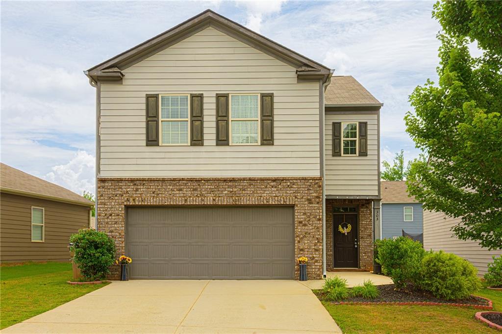 Available 8/1, this 4 bedroom, 2.5 bath home is located on a cul-de-sac in the Blacks Mill Preserve community, and is convenient to everything Dawsonville has to offer. The spacious layout has an open floor plan with granite counters in the kitchen, island with seating, stainless appliances, and a fireplace for your to enjoy. The home has a large primary bedroom with a great walk-in closet and primary bath with 2 sinks and separate tub & shower. The secondary bedrooms are spacious and the hall bath also offers 2 sinks, Laundry is located close by making this convenient to the bedrooms. A backyard to play in, plus a community playground and swimming pool, make this a great home for a growing family. Schedule your appointment today.