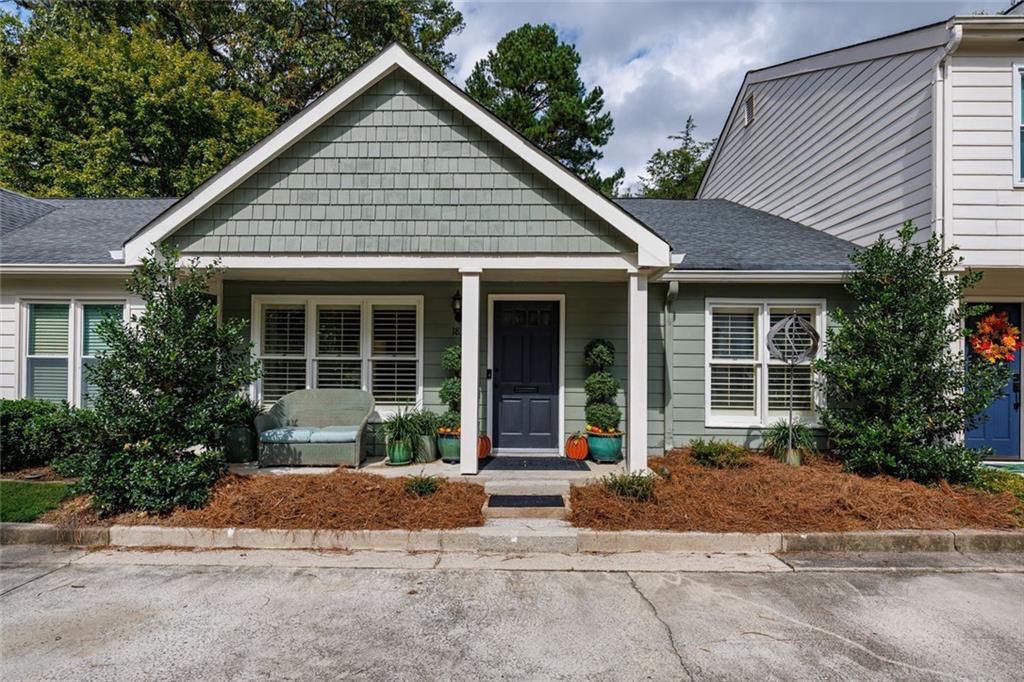 This charming 2-bedroom, 2-bath bungalow sits in the heart of Brookhaven—just a short stroll to favorite restaurants, shops, and all the neighborhood spots you love.
Inside, you’ll find an inviting open floor plan that connects the kitchen, dining area, and family room. The kitchen features stainless steel appliances, granite counters, an island with breakfast bar, and a handy pass-through window that keeps everyone connected. Framed by custom plantation shutters across all front facing windows, the inviting family room draws you in with a cozy wood-burning fireplace, built-ins for display or storage, and a handy beverage chiller that makes relaxing or entertaining a breeze.
Step outside to enjoy a welcoming front porch and a private back patio that’s perfect for morning coffee or quiet evenings. Just across the parking lot, a peaceful neighborhood green space offers wooded views that make you forget you’re in the middle of the city.
This is the kind of home that feels good the moment you arrive—and even better once you’re here.