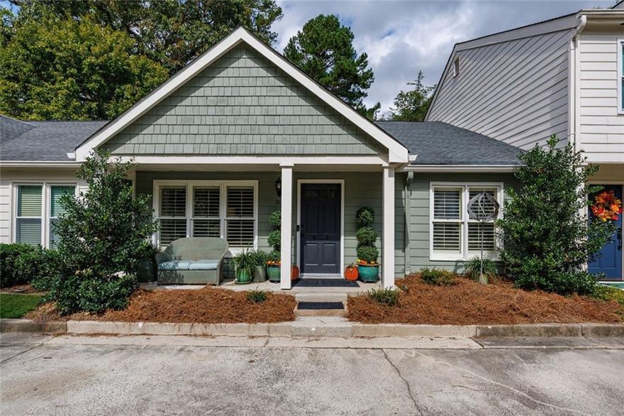 This charming 2-bedroom, 2-bath bungalow sits in the heart of Brookhaven—just a short stroll to favorite restaurants, shops, and all the neighborhood spots you love.

Inside, you’ll find an inviting open floor plan that connects the kitchen, dining area, and family room. The kitchen features stainless steel appliances, granite counters, an island with breakfast bar, and a handy pass-through window that keeps everyone connected. Framed by custom plantation shutters across all front facing windows, the inviting family room draws you in with a cozy wood-burning fireplace, built-ins for display or storage, and a handy beverage chiller that makes relaxing or entertaining a breeze.

Step outside to enjoy a welcoming front porch and a private back patio that’s perfect for morning coffee or quiet evenings. Just across the parking lot, a peaceful neighborhood green space offers wooded views that make you forget you’re in the middle of the city.

This is the kind of home that feels good the moment you arrive—and even better once you’re here.